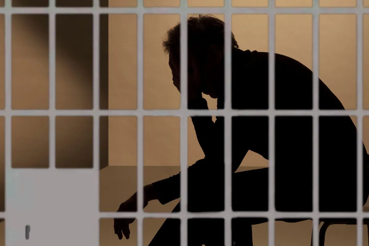 how to mentally prepare for jail A photo of a detained person mentally preparing for jail